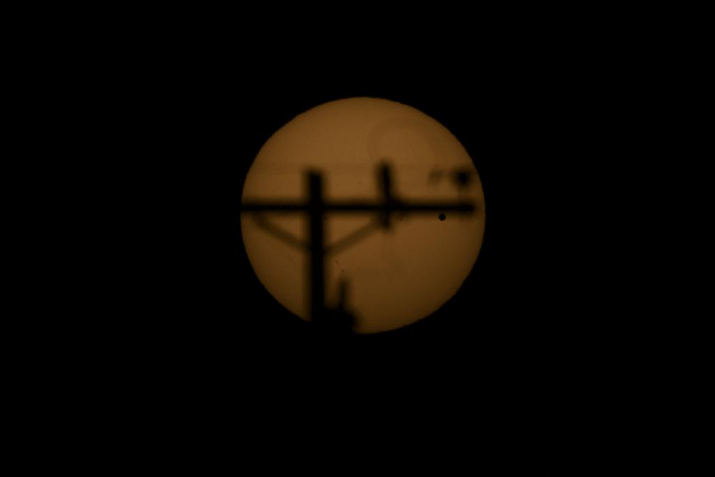 Venus crosses the face of the Sun on June 5, 2012, and a power pole gets in the way. Photo taken at GMARS with a Canon 60Da and Takahashi FSQ-106EDX-III. Click the image for a larger version.