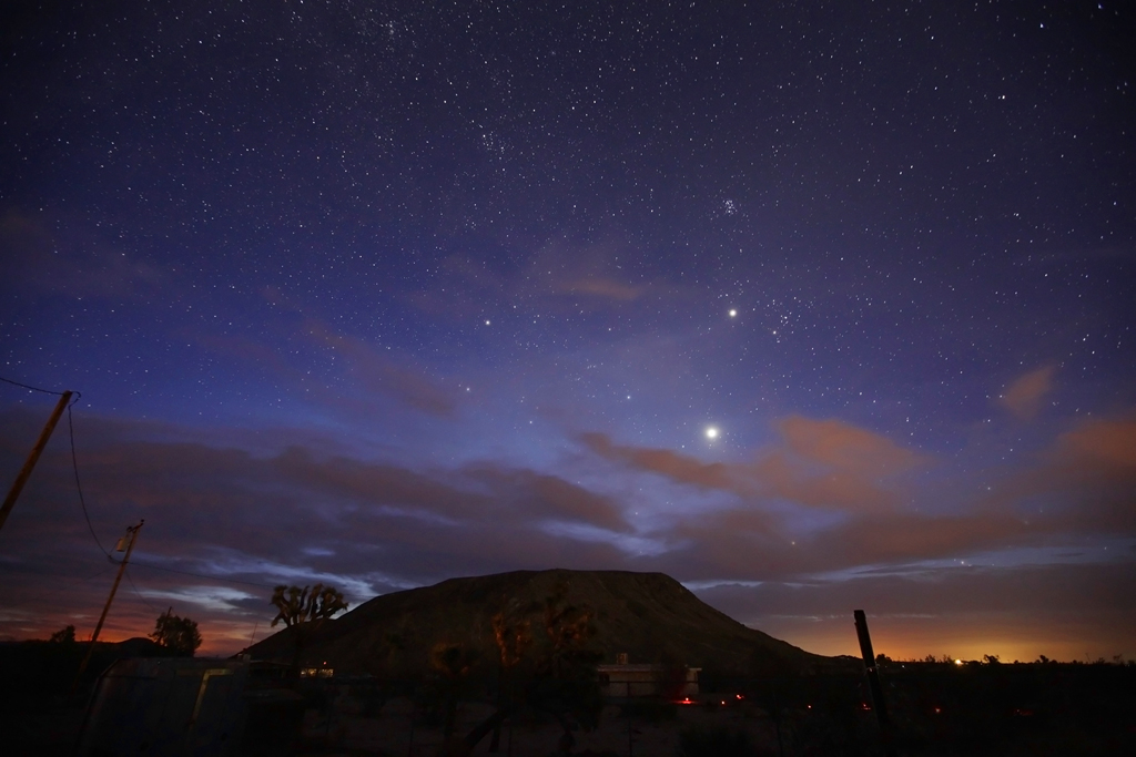 Venus, Jupiter, and the Pleiades rise above Goat Mountain early in the morning on July 29, 2012. Click for a larger version.